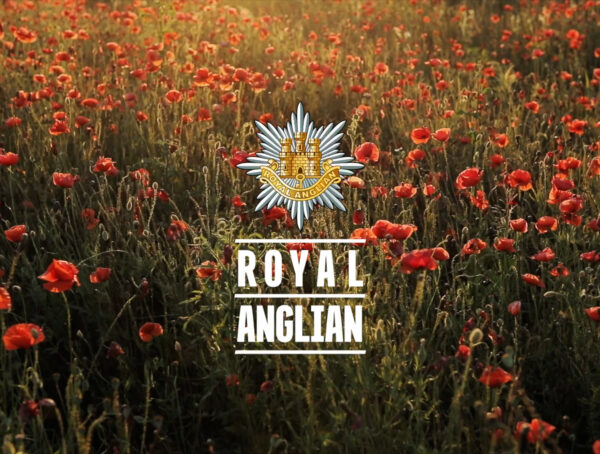 Poppy field with Royal Anglian Regiment logo