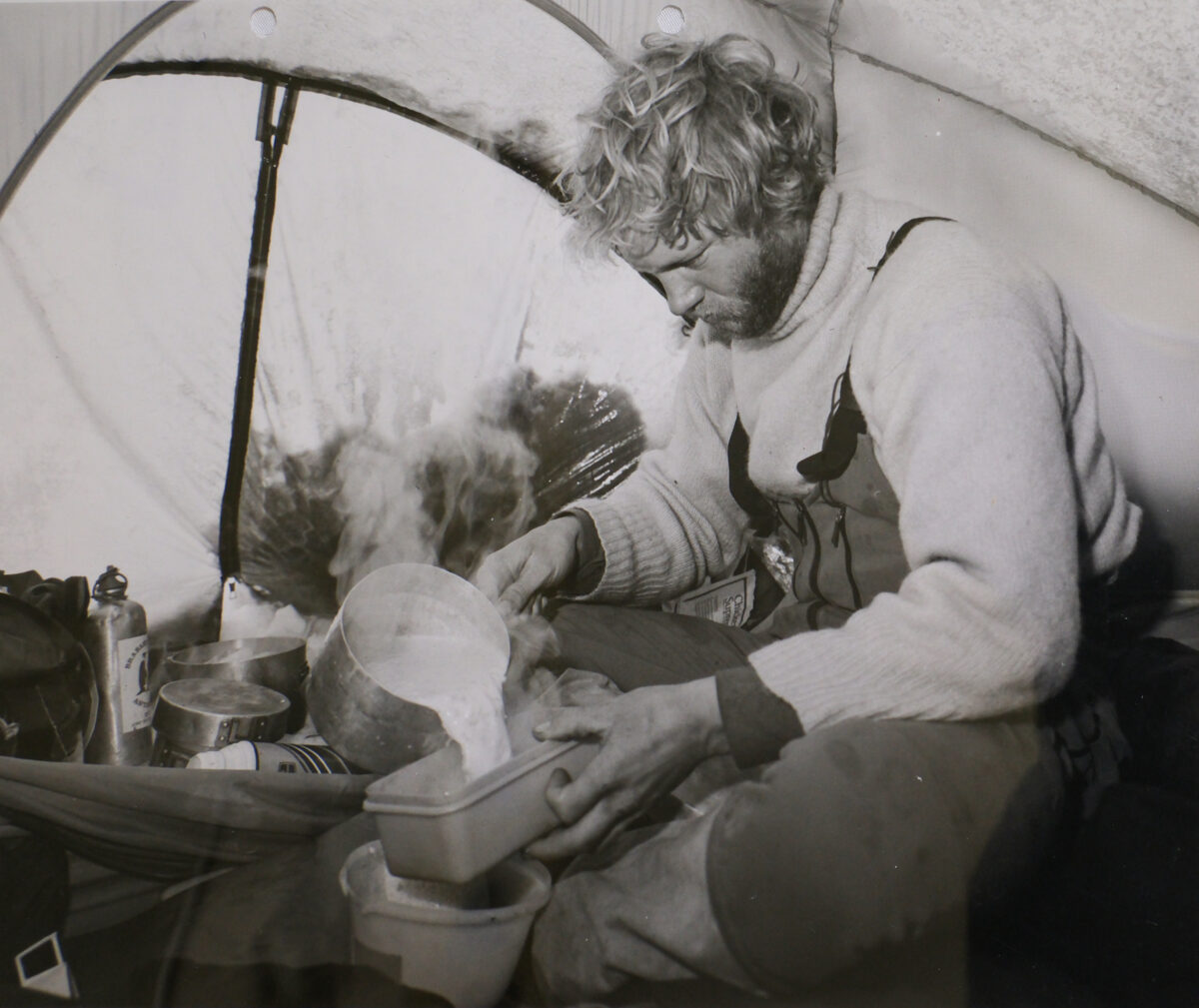 Richard Clements preparing food on Antarctica expedition